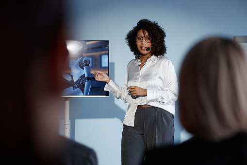 African technology consultant presenting IT solutions to clients